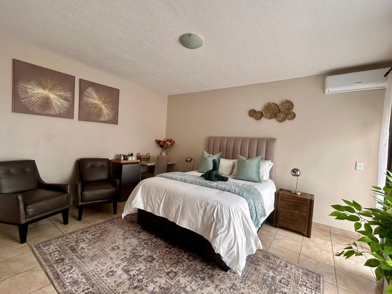 A larger room with armchairs